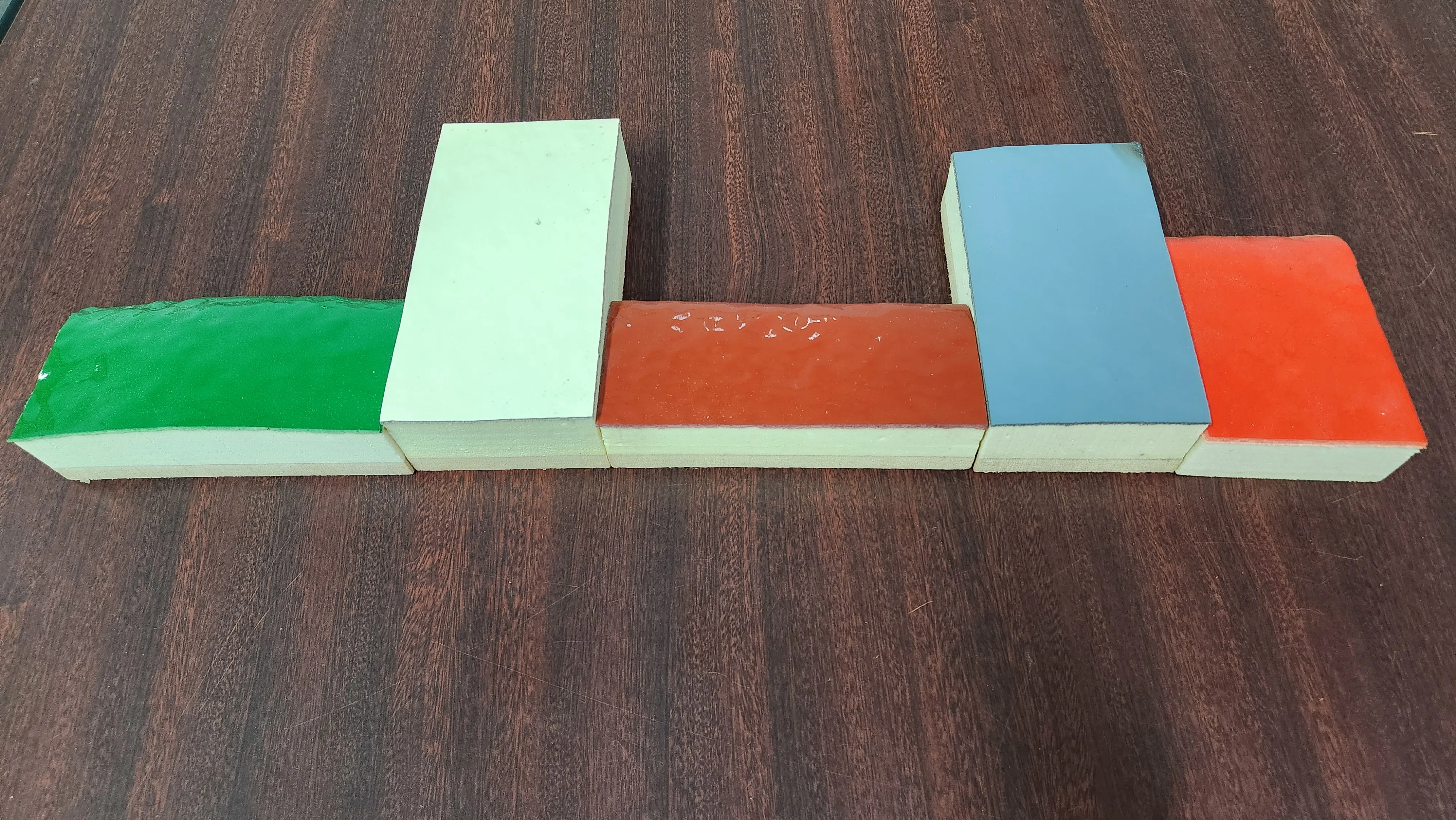 APTECH Foam and Coat color samples — various polyurea top coat colors on PU foam base